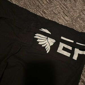 Black Emerson Fry fold over tie India collection pants.